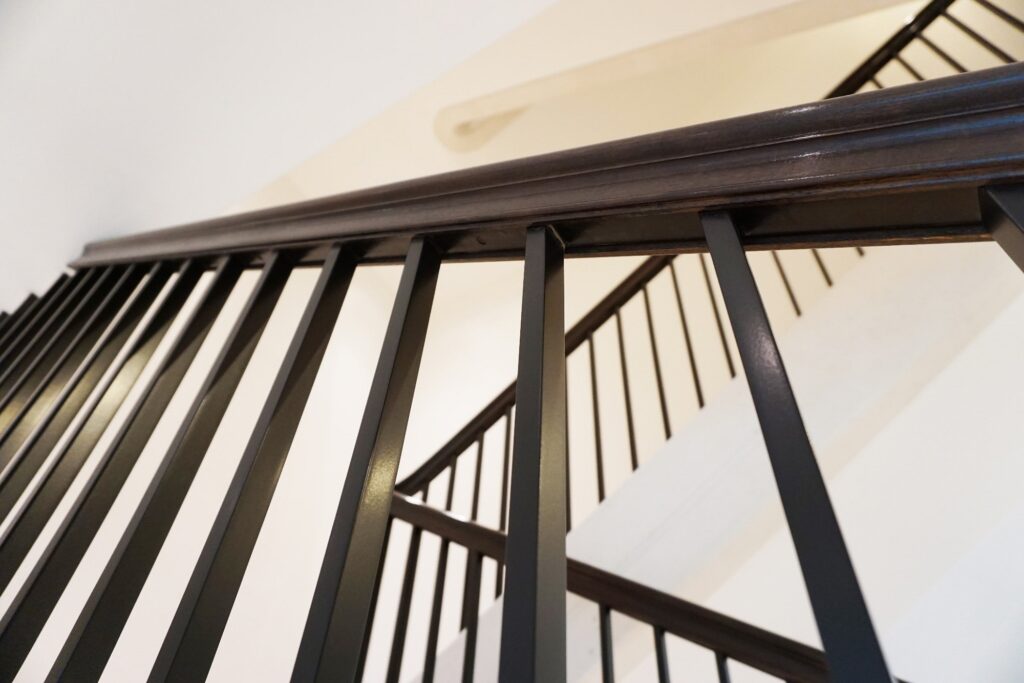 American Black Walnut handrail and spindles, Pembridge Place, Notting Hill by PT Handrails at Clive Durose staircase company