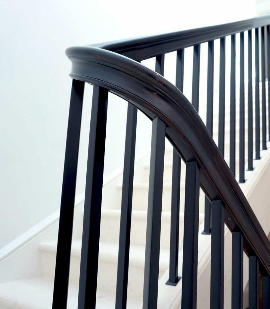 American Black Walnut wooden handrail curve, Pembridge Place, Notting Hill by PT Handrails at Clive Durose staircase company