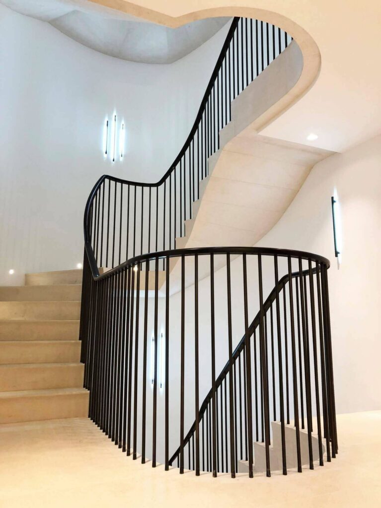 Bannister and handrail in American Black Walnut by PT Handrails at Clive Durose Staircase Project @ Cadogan Square, Chelsea