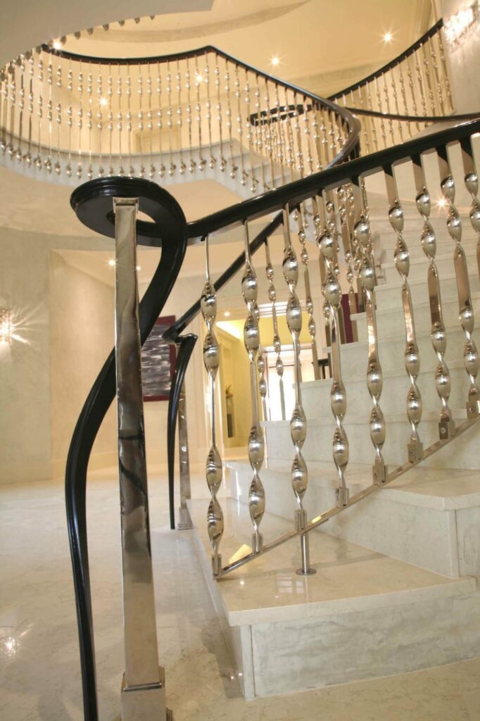 Curvy 'leg style' finish the staircase handrail at Highgate, Hampstead, Staircase & Handrail Project by PT Handrails from Clive Durose