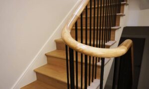 Polished oak finish in this staircase handrail installation in Wilmslow Cheshire by PT Handrails, Clive Durose