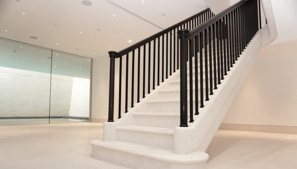 Staircase rising steps, handrail and spindles, Pembridge Place, Notting Hill by PT Handrails at Clive Durose staircase company