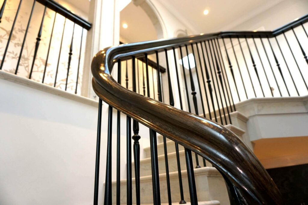 Staircase with twisting lines installed in Harmer Green Lane, Hertfordshire, Designed by Sinead Kelly-Herbert, made and installed by PT Handrails, Clive Durose.